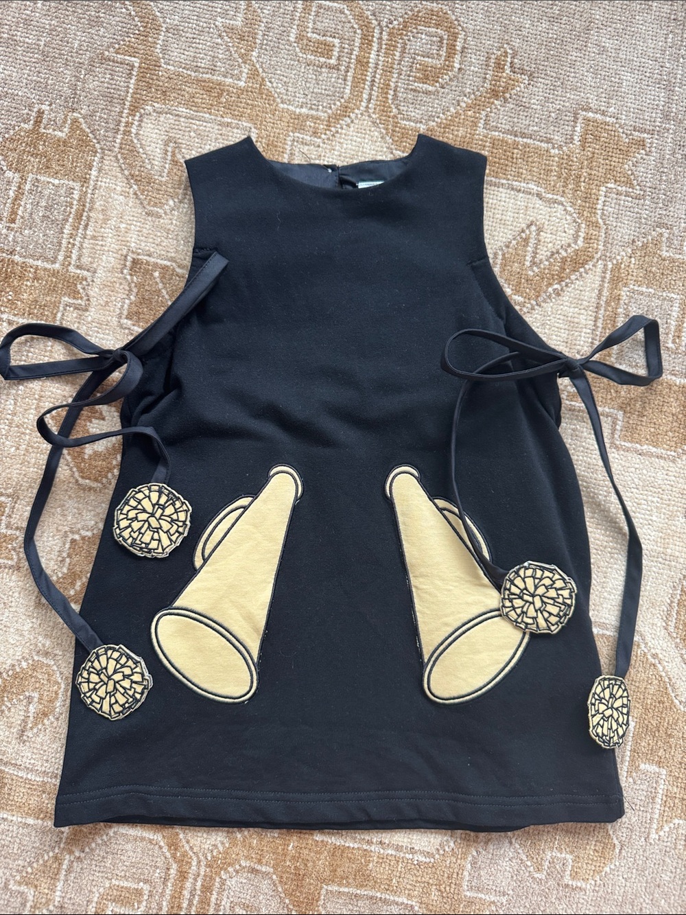 Black Sleeveless Top with Gold Megaphone Appliqués